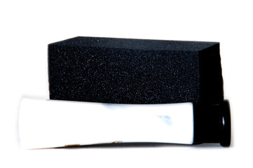 Sponge for cleaning of black footwear