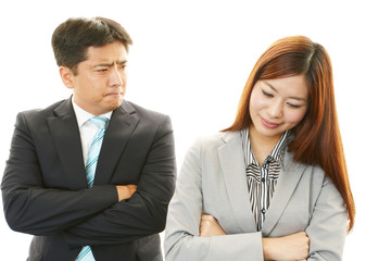 苦悩するビジネスマンとOL