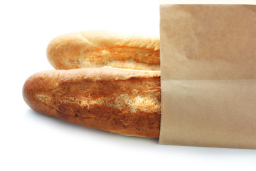 Fresh bread in paper eco bag.