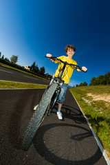 Obraz premium Boy biking