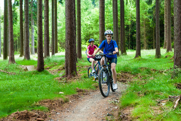 Naklejka premium Two women riding bikes