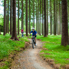 Naklejka premium Two women riding bikes