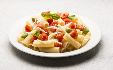 Macaroni with tomatoes  parmesan and basil