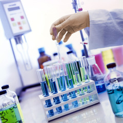 chemical laboratory, technician making a test