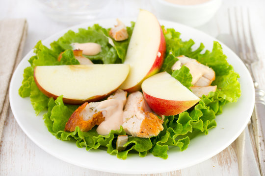 salad with lettuce, chicken and apple