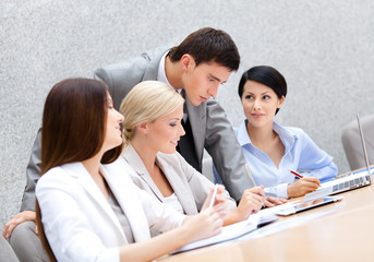 Fototapeta premium Business people at the seminar discuss current issues