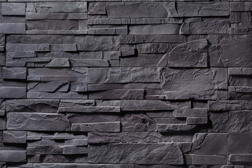 Textur der grauen Steinmauer