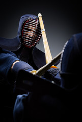 Close up view of competition of two kendo fighters - 52864959