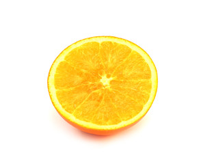 Half ripe orange isolated on white background