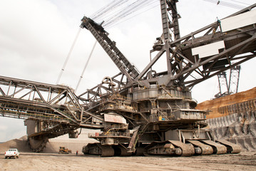 Fototapeta na wymiar A large bucket wheel excavator in a brown-coal mine