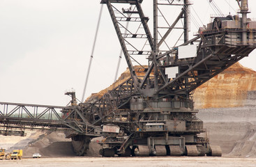Fototapeta na wymiar A large bucket wheel excavator in a brown-coal mine