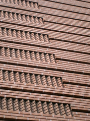Obraz na płótnie Canvas Red Brick pattern side of building