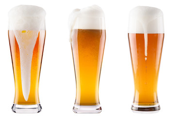 Frosty fresh beer collection with foam isolated
