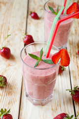 strawberry smoothie in a tall glass