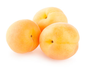 ripe apricots isolated on white background