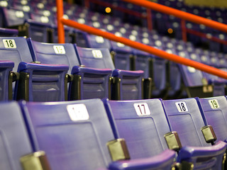 Fototapeta premium Blue Folding Seats at an Indoor Sports Arena