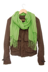 Brown jacket and green scarf are on hanger.