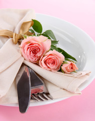 Served plate with napkin and rose close-up