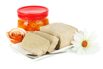 Tasty halva with orange isolated on white