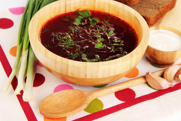 Delicious borsch on table close-up