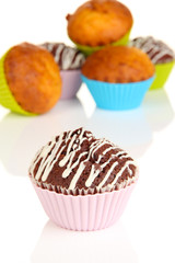 Sweet cupcakes on white table