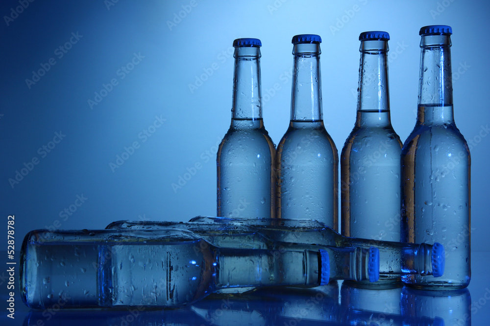 Canvas Prints Water bottles on blue background