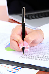 Close up of businesswoman hands during work