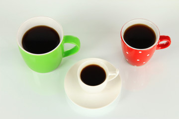 Cups of coffee isolated on white
