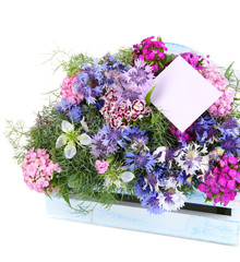 Beautiful bouquet in basket isolated on white