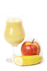 Fresh fruit juice cocktails with apple and banana in a glass.