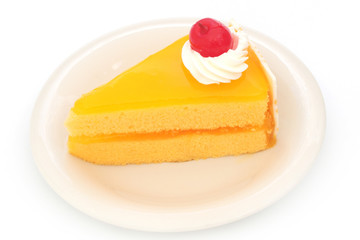 Sliced orange cake on plate