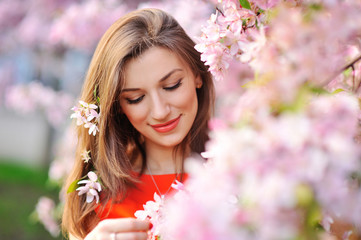 Fototapeta premium Beautiful Spring Girl with flowers
