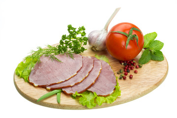 Ripe fresh ham with vegetables
