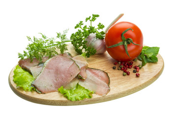 Ripe fresh ham with vegetables
