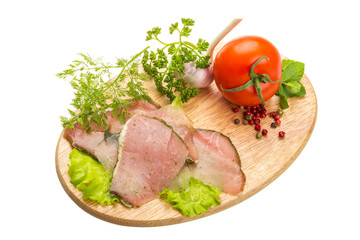 Ripe fresh ham with vegetables