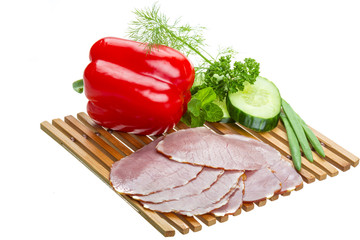 Ripe fresh ham with vegetables