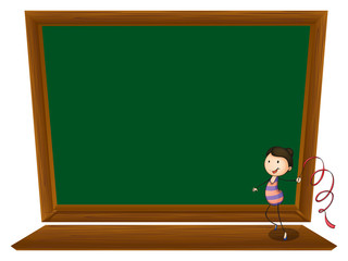 A girl dancing in front of an empty blackboard