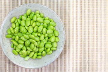 edamame nibbles, boiled green soy beans, japanese food