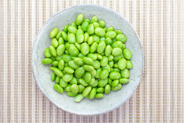 edamame nibbles, boiled green soy beans, japanese food