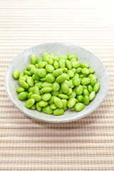 edamame nibbles, boiled green soy beans, japanese food