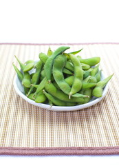 edamame nibbles, boiled green soy beans, japanese food