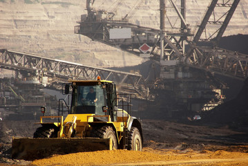 A bulldozer and a very large bucket wheel excavator