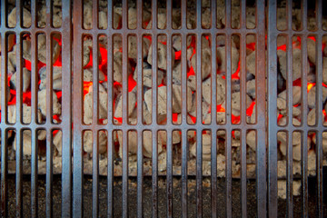 barbecue embers glowing in red