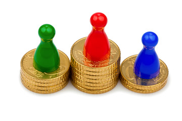 Spielfiguren auf Münzen