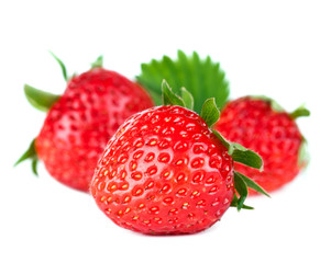 Beautiful ripe red strawberries with leaves.