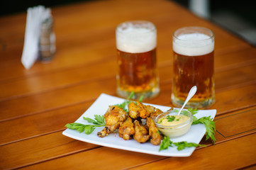 beer with meal on the table