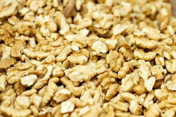 Close-up of shelled walnuts background