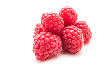 Ripe raspberries  on white background