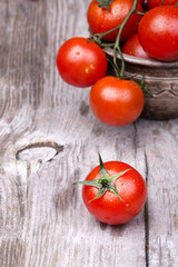 Cherry tomatoes on wooden table