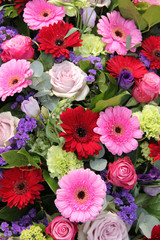 Wedding arrangement in red, purple and pink
